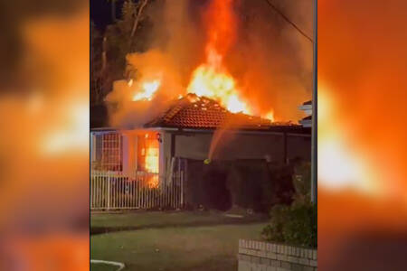 Dozens of firefighters tackle house blaze in Sydney’s west