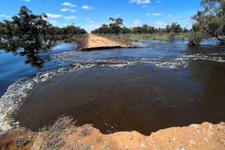 Hays Shire Council fills in an Olympic pool sized pothole after flooding