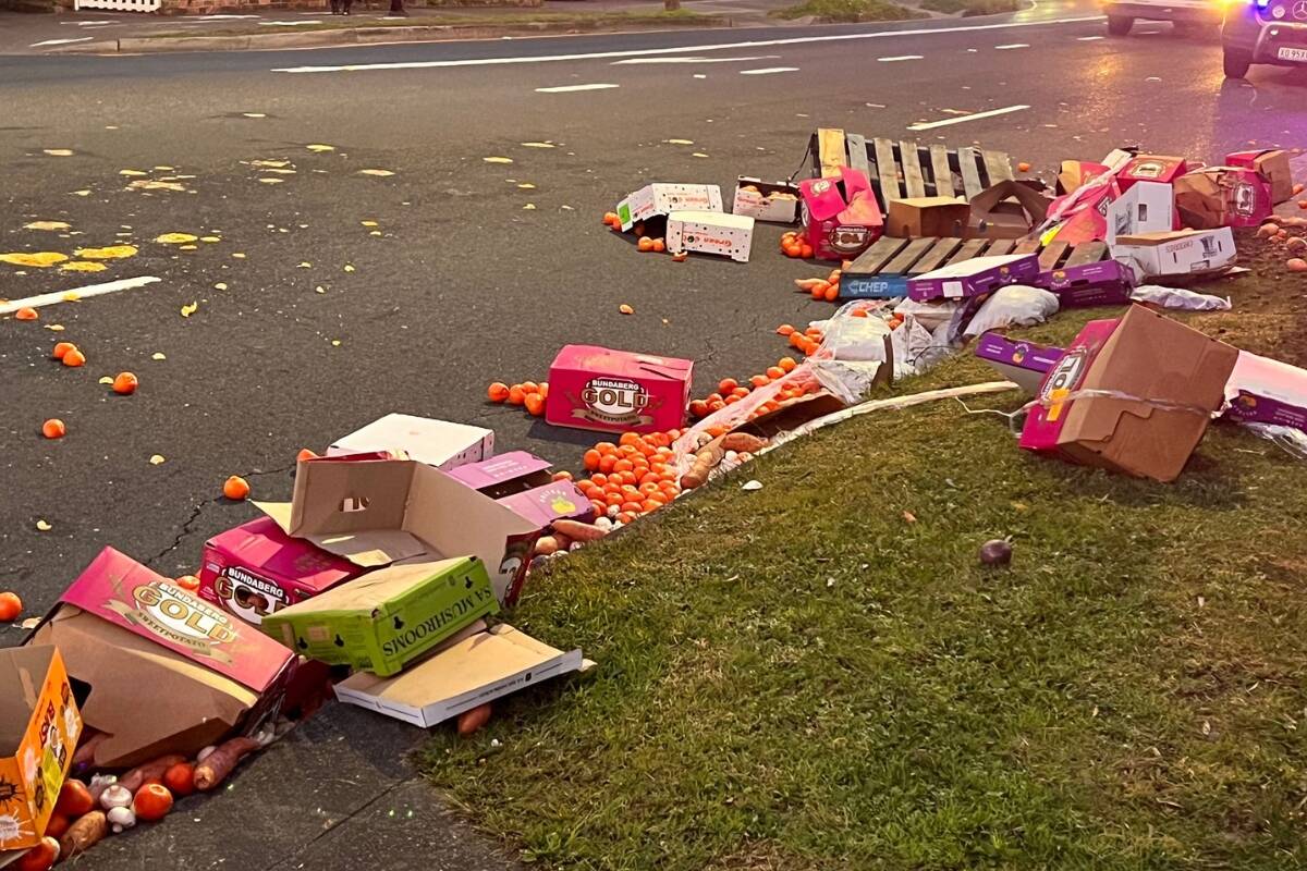 Article image for ‘Impromptu fruit market’ – Truck carrying fresh produce spills over Sydney road