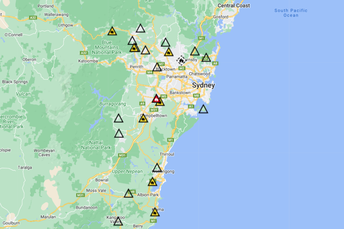 Article image for Multiple fires break out across New South Wales as crews battle out of control blaze in south-west Sydney